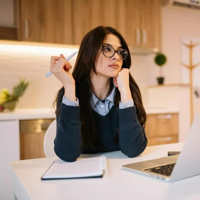portrait-of-beautiful-girl-with-eyeglasses-using-laptop-at-home-office--e1668602935545.jpg